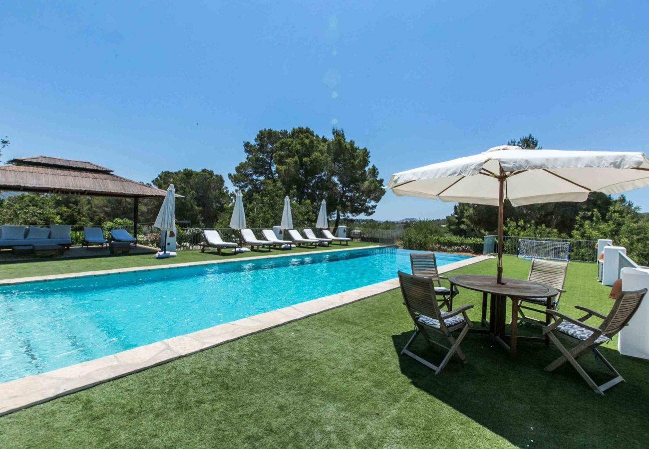 Garden and private swimming pool of the villa Numy in Santa Eulalia