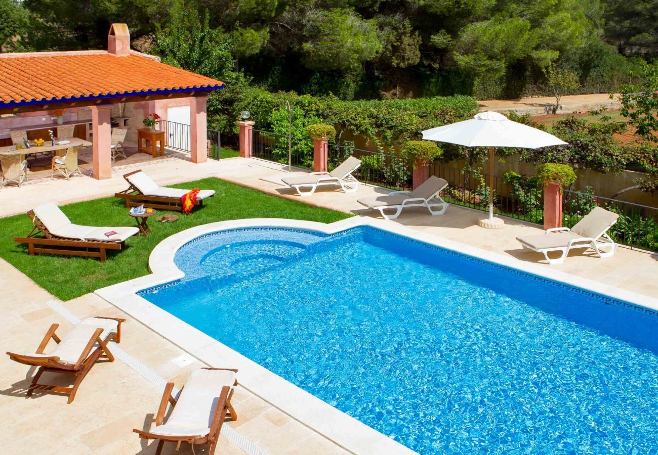 Views of the Ibiza country villa with its terrace and private pool